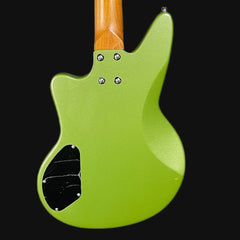 Green electric guitar body with a black pickguard on a black background