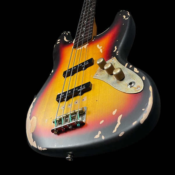 Vintage V74MRJP Icon Fretless Bass in Distressed Sunset Sunburst inc Fender Flatwounds