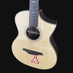 Acoustic guitar with a visible brand logo on a black background