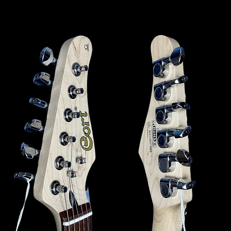 Two guitar heads with 'Gotoh' branding on a black background