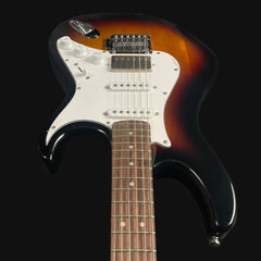 Electric guitar with sunburst finish on a black background