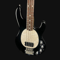 Black electric bass guitar with a unique body design on a black background