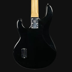 Black electric guitar with a wooden neck on a black background