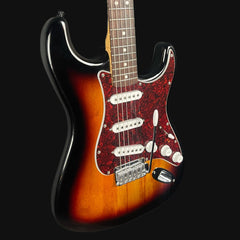 Electric guitar with a sunburst finish on a black background