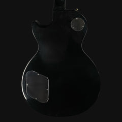 Black electric guitar on a black background