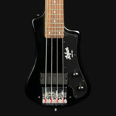 Black bass guitar with a clear body on a black background