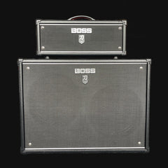 Two Boss guitar amplifier cabinets stacked on a black background