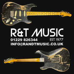 Vintage electric guitar with R&T Music branding on a black background