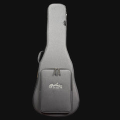 Gray guitar case with Martin logo on a black background