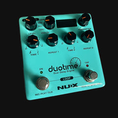 Nux Duotime Dual Delay Engine guitar effects pedal on a black background