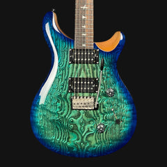 Blue and green electric guitar with a wavy pattern on a black background