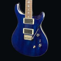 Blue electric guitar on a black background