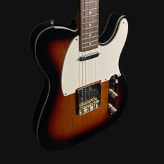 Electric guitar with a sunburst finish on a black background