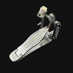 Drum pedal with 'Tama' branding on a black background