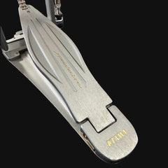 Silver multi-tool with brand name on a black background