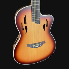 Acoustic guitar with a sunburst finish on a black background