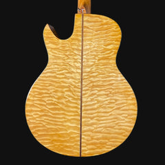 Close-up of a guitar's wooden back and sides on a black background