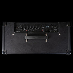 Black guitar amplifier with control panel on a white background