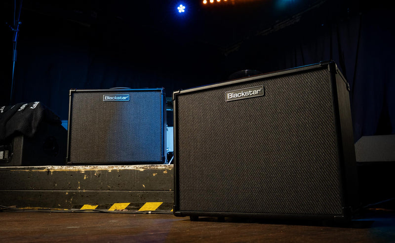 Blackstar guitar amplifiers on a stage with dark background