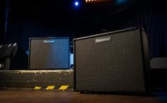 Blackstar guitar amplifiers on a stage with dark background