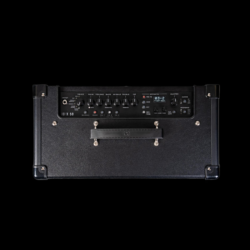 Black guitar amplifier on a white background