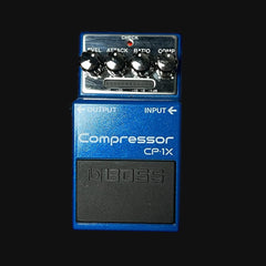 Blue Boss CP-1X compressor pedal on a black background