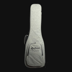 Gray guitar case with 'Kauffman Guitars' branding on a black background