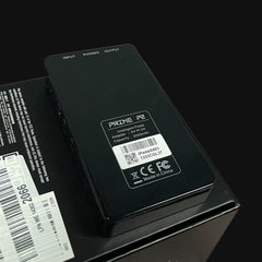 Black battery pack with label on a black background