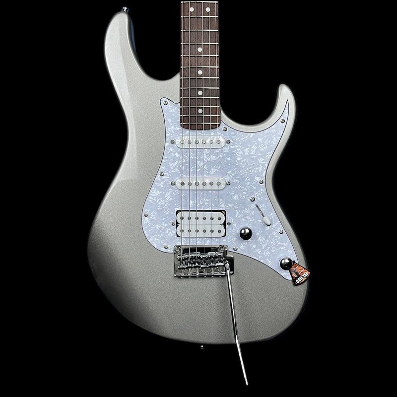 Cort G250 Silver Metallic guitar with a basswood body, maple neck, and Jatoba fretboard, showing a double-cutaway design, humbucker pickups, and a two-point tremolo.